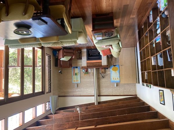 An award-winning, architect-designed eco-home, in a scenic valley,  just minutes to Australia's best surf beaches and shops.