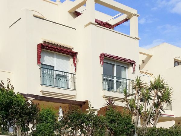 Duplex apartment overlooking sea and golf course.