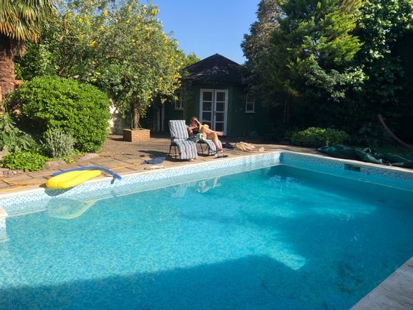 Single storey house with pool in Esher, Surrey