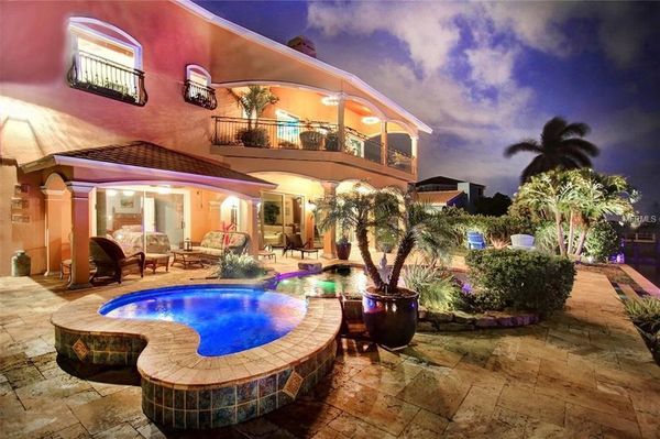 Surrounded by Water And Steps to the Beach.