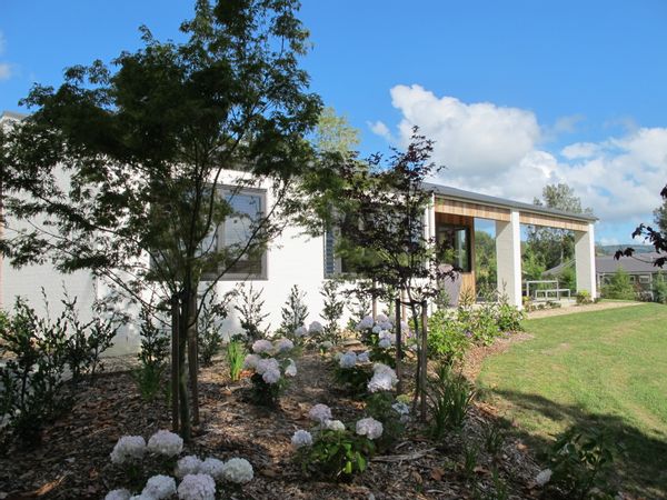 A new country home in 1ha of lawn, 10 min walk to the village.