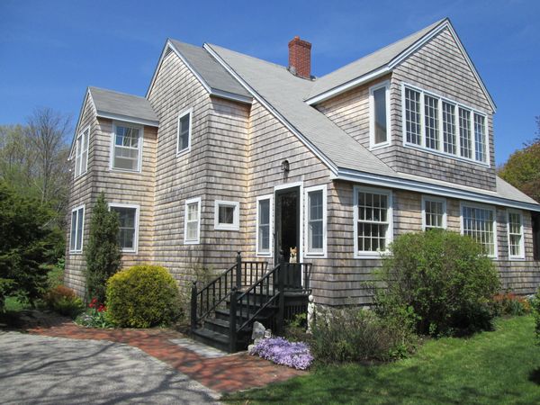 Lovely 3 bdrm, 2 bath natural shingled home with glimpse of the ocean