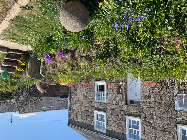 Traditional granite farmhouse in an ancient landscape