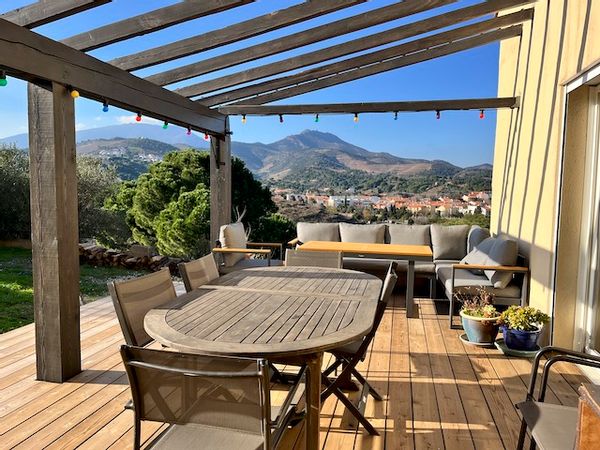 House on the Mediterranean coast with mountain views