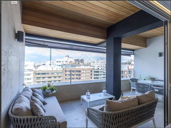 Contemporary 4 bedroom.  Stone, wood and spectacular glass wall balcony steps from Turia Park.