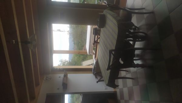 Rez-de-chaussée vue dominante d'une maison paille et terre