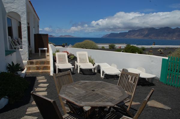 Encantadora casita frente al mar con jardín y terraza
