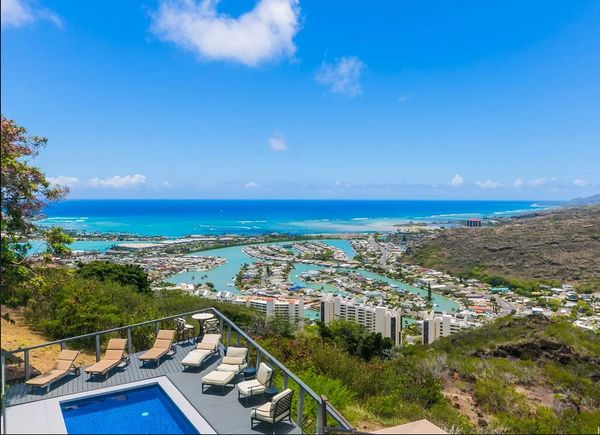 Master suite in a Hawaii Honolulu home with spectacular, panoramic ocean, coastal, and marina views