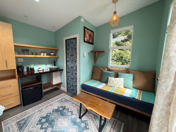 Private Backyard Cabin with private access to Hot tub and Sauna!