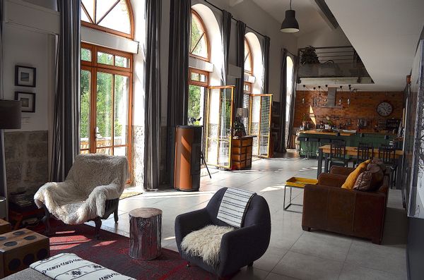 Serene riverfront loft in converted silk factory in the south of France