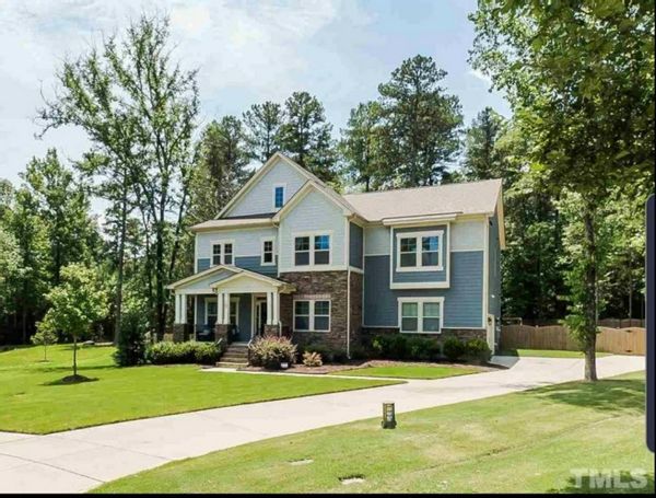 Beautiful House is the heart of Pittsboro. Close to Jordan Lake. Includes Camper and (2) Motorcycles