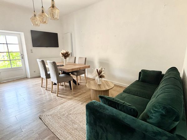 Appartement avec petit coin jardin