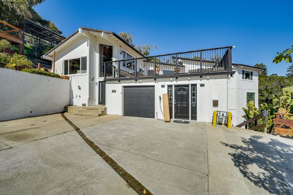 Discover 2BR and den, 2.5BA retreat in Aptos, perched on a peaceful hill with sweeping ocean views.