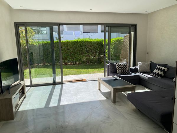 Appartement avec jardin dans résidence avec piscine