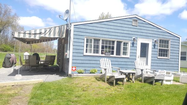 BEAUTIFUL 2 BEDROOM COTTAGE WITH WATER VIEWS & DOCKAGE! NEW FOR 2019. ROW BOAT INCLUDED!