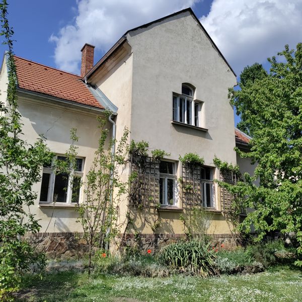 Top floor of a house with garden