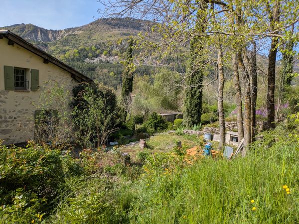 Small stone house with mountain views