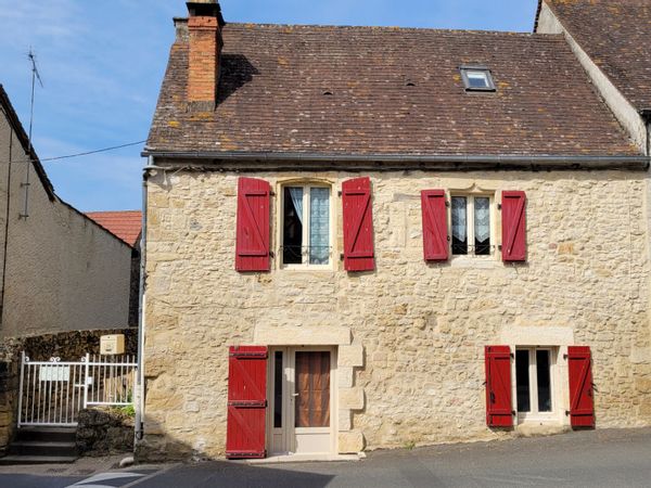 la maison aux volets rouges