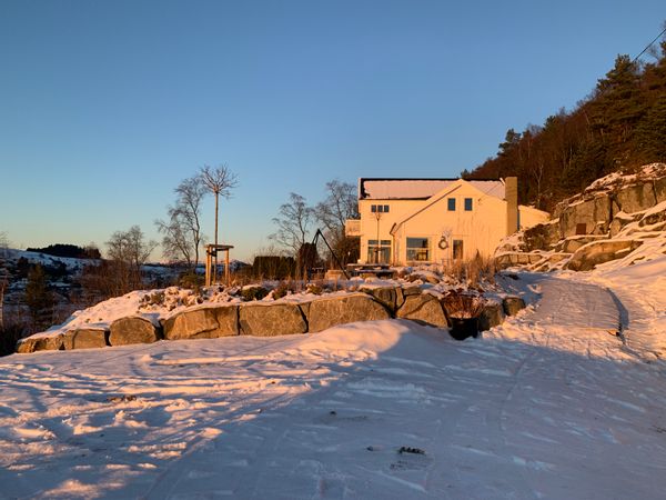 Family home with a 180 degree fjord view for long evenings. All year round outdoor area