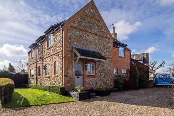 Flint and brick house in North Norfolk village.
