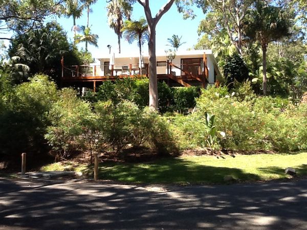 Solid beach house ,in a big timber garden looking down on the bay