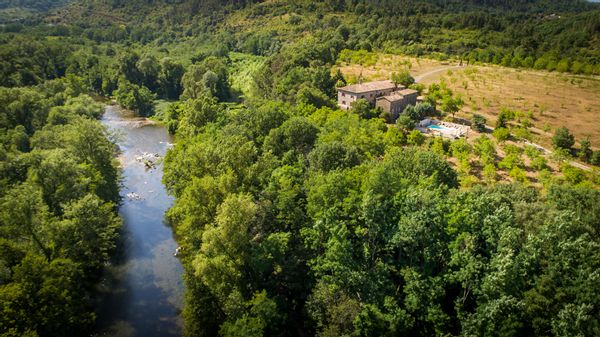 A traditional farmhouse in the South of France with pool and private riverfront.