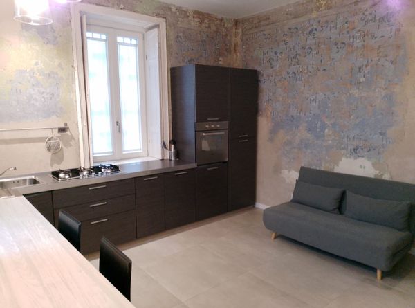 Casa di Davide,  piccolo bilocale con bagno, camera da letto e zona giorno con cucina.