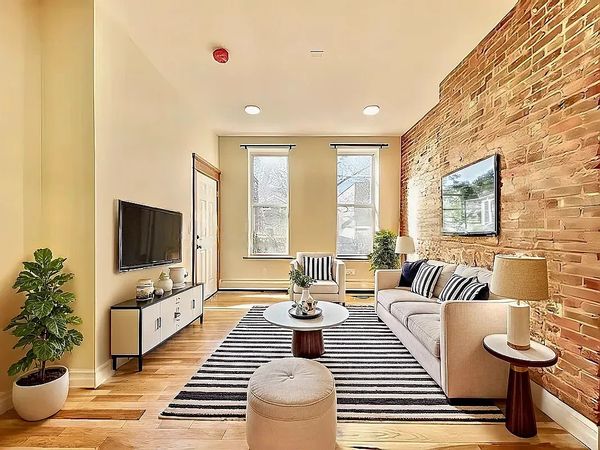Bright & Cozy 3-Room Retreat with Exposed Brick Charm