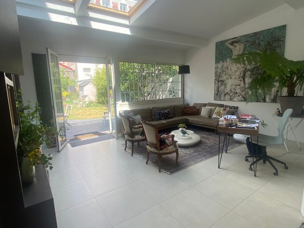 Grande maison avec jardin au bord de Paris