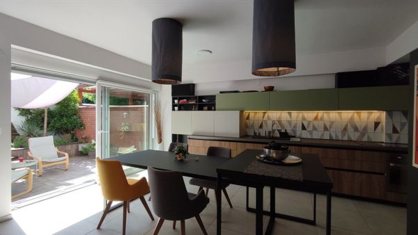 Two-level apartment with a garden