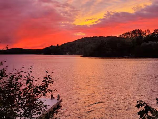 Tranquil lakeside retreat with 240 feet of pristine shoreline...