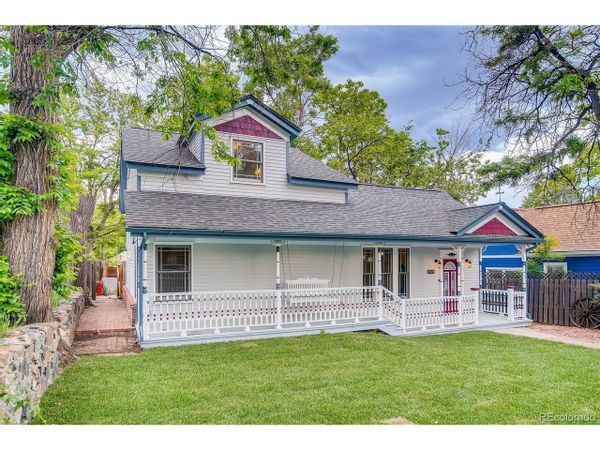 Custom 1900s Victorian Doll House located in a fun, trendy Denver Neighborhood