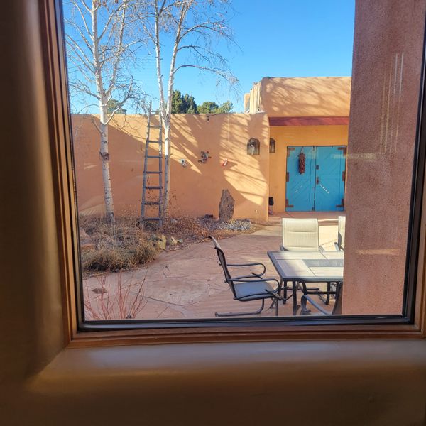 John's house Santa Fe New Mexico.  Private Courtyard with flowers blooming throughout the year.  Views of mountains of Santa Fe.  Short drive to downtown plaza and amazing art scene.  Walking distance to Native American and Folk Art museums.