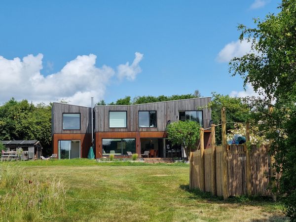 Large eco home near London, huge garden, secure raised 5m pool, to swop this summer