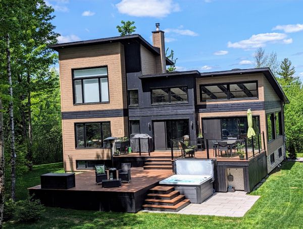 Magnifique maison contemporaine tout vitrée vie sur la forêt (près de Sherbrooke)