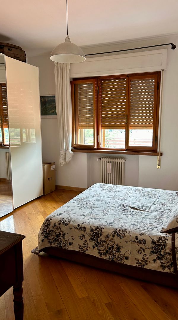 Paula's house - private room with shared bathroom."