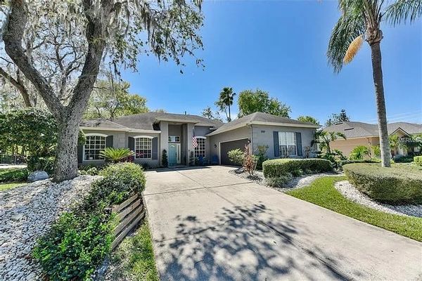 Renovated contemporary home with pool and parking in small gated community