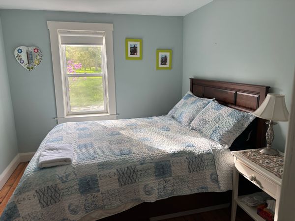 Bedroom with private bathroom and sitting room. Shared kitchen.