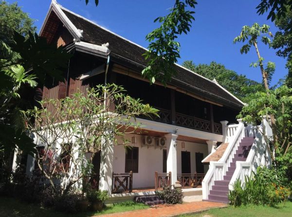 Vivanh's private room in a beautiful neo-colonial house surrounded by a garden and river
