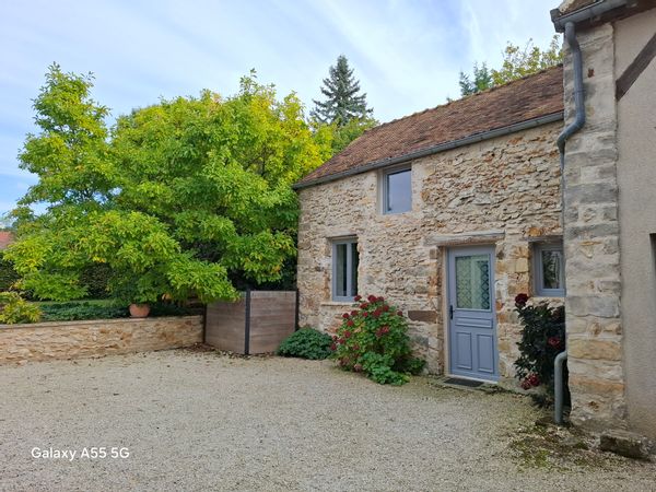 Corinne and Arnaud's charming millstone house