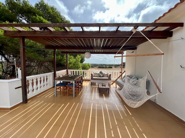 Apartamento en Menorca con gran terraza a pie de playa