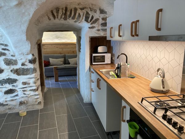 Ancienne écurie rénovée en chaleureux appartement