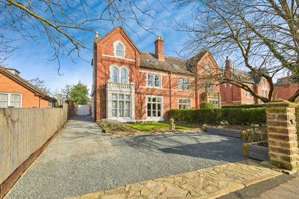 A large, elegant Victorian home brimming with period features