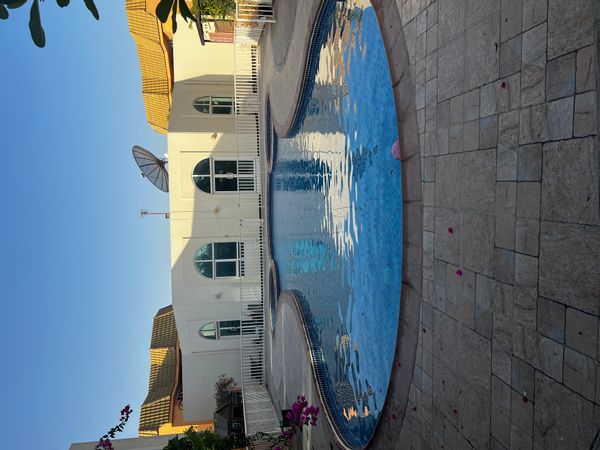 Our house is very spacious and comfortable; three double bedrooms with en suite bathrooms, a charming small back garden, one of 16 townhouses that share a private pool (there is also a gym that is very basic but perfectly usable), 1.6km from the beach and near lots of cafes and a supermarket