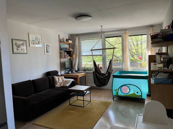 A minimalist family-friendly apartment in a quiet area with convenient public transport to city center.
