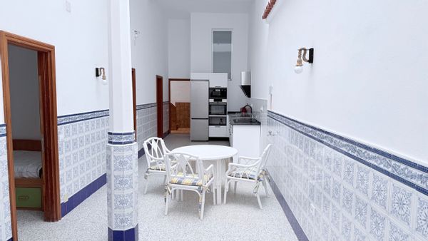 Room in a coliving space with everything you need to work remotely.