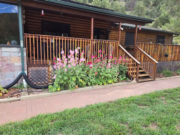 The Norsemen of the Rockies:   7 bedroom raised ranch with mostly western motif. On 3 acres backed up to the mountain.