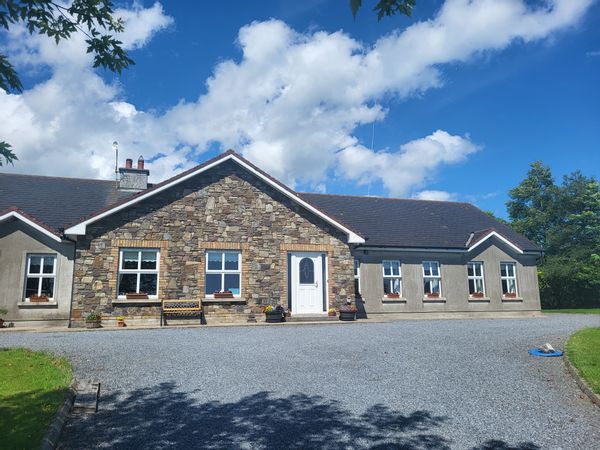 Leanne's house Our family home is a large, bright and spacious bungalow, located in the peaceful countryside of county Kilkenny. Our home can accommodate large families, with 4 bedrooms it can comfortably sleep 7 people. Large  private outdoor garden area with plenty to keep children entertained, trampoline, swings, slide, sand pit etc.