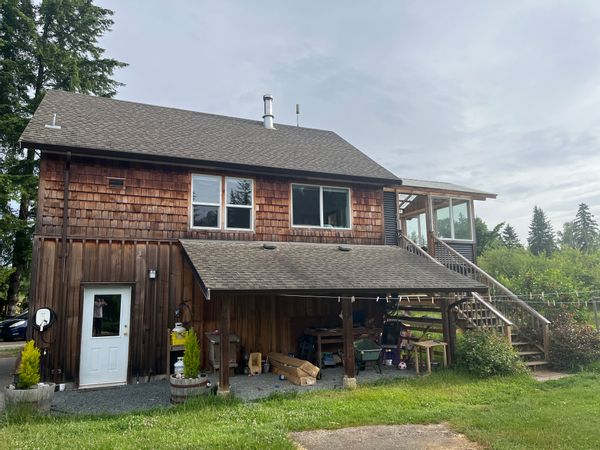 House on the River in Merville
