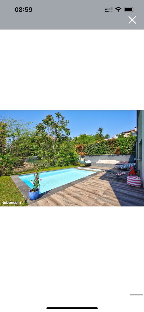 Maison au calme à 10 minutes de lyon dans un cadre verdoyant avec piscine chauffer